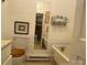 Bathroom features a white vintage claw foot bathtub, and toilet at 714 E Dunlap St, Lancaster, SC 29720