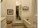 Bathroom features a white vintage claw foot bathtub, and toilet at 714 E Dunlap St, Lancaster, SC 29720