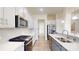 Well-equipped kitchen with stainless steel appliances, white subway tile backsplash, and modern fixtures at 7651 Fenn Way, Fort Mill, SC 29707