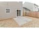 Backyard featuring a small patio and wooden fence at 7806 Mcgarry Trl, Charlotte, NC 28214