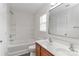 Bright bathroom featuring a double sink vanity, soaking tub, and modern fixtures at 7806 Mcgarry Trl, Charlotte, NC 28214