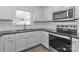 Well-equipped kitchen featuring stainless steel appliances and ample cabinet space for storage at 7806 Mcgarry Trl, Charlotte, NC 28214