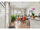 Charming dining area with large windows and stylish furnishings at 8002 Mariners Pointe Cir, Denver, NC 28037