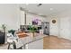 Charming kitchen featuring granite countertops, a breakfast bar and stainless steel appliances at 8002 Mariners Pointe Cir, Denver, NC 28037