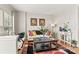Comfortable living room with hardwood floors, natural light, and stylish decor at 8002 Mariners Pointe Cir, Denver, NC 28037