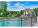 Beautiful community pool and recreation area with lake views, perfect for relaxation and community gatherings at 8002 Mariners Pointe Cir, Denver, NC 28037