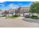 View of the townhome community, showcasing well-kept properties and attractive landscaping at 8002 Mariners Pointe Cir, Denver, NC 28037
