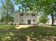 Spacious backyard featuring a well-maintained lawn perfect for outdoor activities and relaxation at 8030 Glencannon Dr, Charlotte, NC 28227