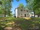 Expansive backyard offering ample space, mature trees, and a well-kept lawn at 8030 Glencannon Dr, Charlotte, NC 28227