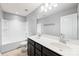 This bathroom features a double vanity, a shower-tub combination, and modern fixtures at 8400 Empress Ct, Charlotte, NC 28227