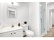 Clean and bright bathroom featuring a glass door shower and stylish vanity at 8632 Island Point Rd, Sherrills Ford, NC 28673