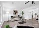Cozy living room with plush carpet, modern decor, and natural light, creating a comfortable atmosphere at 8632 Island Point Rd, Sherrills Ford, NC 28673
