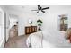 Serene main bedroom with carpet, ceiling fan, ample space and a well-placed accent cabinet at 8632 Island Point Rd, Sherrills Ford, NC 28673