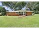 Charming brick home with screened porch and spacious backyard perfect for outdoor living at 967 Hilldale Dr, Lancaster, SC 29720