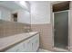 Well-maintained bathroom featuring a walk-in shower and neutral-toned tile at 967 Hilldale Dr, Lancaster, SC 29720