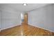 Cozy bedroom with hardwood floors and neutral paint, offering a blank canvas at 967 Hilldale Dr, Lancaster, SC 29720