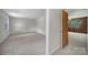Spacious, carpeted bedroom with ample natural light, freshly painted neutral walls at 967 Hilldale Dr, Lancaster, SC 29720