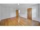 Bedroom with hardwood floors and neutral paint, awaiting your personal touches at 967 Hilldale Dr, Lancaster, SC 29720