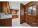Traditional kitchen featuring wood cabinets, white countertops and classic tile flooring at 967 Hilldale Dr, Lancaster, SC 29720