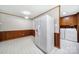 Bright kitchen with white appliances and wooden trim at 967 Hilldale Dr, Lancaster, SC 29720