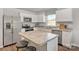 Spacious kitchen with stainless steel appliances, an island, and ample counter space at 10127 Florentine Way, Charlotte, NC 28214
