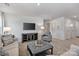 Spacious living room featuring neutral colors, modern decor, and plenty of natural light at 10127 Florentine Way, Charlotte, NC 28214