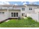 Spacious backyard with green grass, patio, and fencing at 10225 Alexander Martin Ave, Charlotte, NC 28277