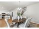 Open-concept dining area adjacent to the kitchen, featuring modern decor and ample seating at 10225 Alexander Martin Ave, Charlotte, NC 28277