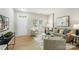 Inviting living room with neutral tones, stylish decor, and abundant natural light at 10225 Alexander Martin Ave, Charlotte, NC 28277