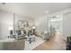 Bright living room featuring modern furniture and hardwood floors at 10225 Alexander Martin Ave, Charlotte, NC 28277