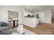 Bright open floor plan with sitting room and kitchen at 10225 Alexander Martin Ave, Charlotte, NC 28277