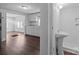 Hallway view into a bathroom and kitchen at 103 Garfield Ave, Albemarle, NC 28001