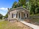 Charming single-Gathering home with a covered front porch and a walkway at 103 Garfield Ave, Albemarle, NC 28001