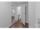 Hallway leading to a bathroom and kitchen at 103 Garfield Ave, Albemarle, NC 28001