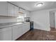 Updated kitchen featuring sleek countertops, ample storage, and stainless appliances at 103 Garfield Ave, Albemarle, NC 28001