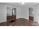 Bright living room with hardwood floors, fresh paint, and open floor plan at 103 Garfield Ave, Albemarle, NC 28001