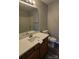 Bathroom featuring dark wood cabinets and a bath and shower combo at 1104 Plaza Walk Dr, Charlotte, NC 28215