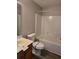 Clean bathroom featuring a shower-tub combo and functional vanity at 1104 Plaza Walk Dr, Charlotte, NC 28215
