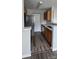 Efficient kitchen featuring stainless steel appliances, wood cabinets, and ample counter space for meal preparation at 1104 Plaza Walk Dr, Charlotte, NC 28215