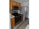Modern kitchen with stainless steel appliances, sleek countertops, and ample storage space for culinary enthusiasts at 1104 Plaza Walk Dr, Charlotte, NC 28215