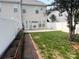 Fenced backyard offers a cozy patio area and a well-maintained lawn perfect for outdoor enjoyment at 12378 Swan Wings Pl, Huntersville, NC 28078