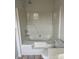 Modern bathroom with a clean bathtub, neutral walls, and modern tiles on the floor at 12378 Swan Wings Pl, Huntersville, NC 28078