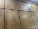 Showcasing the modern, brown color cabinets of the house at 12378 Swan Wings Pl, Huntersville, NC 28078