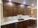 Modern kitchen featuring stylish cabinets, countertops, and stainless steel appliances at 12378 Swan Wings Pl, Huntersville, NC 28078