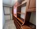 Well-organized walk-in closet featuring custom built-in shelving and ample storage at 12378 Swan Wings Pl, Huntersville, NC 28078