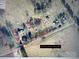 An aerial view highlighting property lines, acreage, and a home nestled in a rural setting, ideal for nature lovers at 1238 Carl Allen Rd, Edgemoor, SC 29712