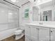 Updated bathroom with a glass-enclosed shower and a vanity with a mirror and modern fixtures at 1238 Carl Allen Rd, Edgemoor, SC 29712