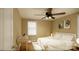 Bedroom featuring hardwood floors, a ceiling fan, a desk, and natural light from the large window at 1238 Carl Allen Rd, Edgemoor, SC 29712