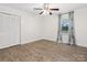 Bright bedroom with hardwood floors, neutral paint, and a spacious closet at 1238 Carl Allen Rd, Edgemoor, SC 29712