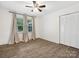 Bright bedroom with hardwood floors, neutral walls, and a large closet at 1238 Carl Allen Rd, Edgemoor, SC 29712
